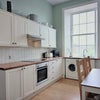 Photo 3: Bright, clean kitchen