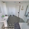 Photo 5: Shared bathroom