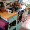 Photo 2: Cabin kitchen with gas stove