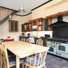 Photo 3: Large Country Kitchen with extendable table
