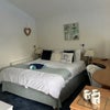 Photo 1: Queensize bed very large room 