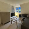 Photo 3: Office/Living Space - there is a shared spare room which provides a space to work or relax independe
