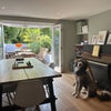 Photo 8: The living area & Bagel the dog. 