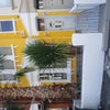 Photo 7: Front of house 
