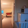 Photo 9: Fridge/freezer  and microwave outside double  bedroom.