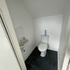 Photo 13: Top Floor Toilet.