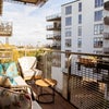 Photo 2: Balcony overlooking the river