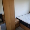 Photo 5: Wardrobe and bedside drawer