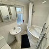 Photo 9: LARGE SHARED BATHROOM