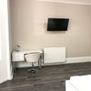Photo 2: Desk and TV