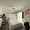 Photo 5: Spacious Bedroom with a large work space including a Smart TV