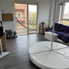 Photo 9: Living room with pole fitness