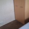 Photo 6: Smaller room with a double bed and wardrobe.  Can fit in a small reading table 