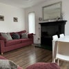 Photo 1: Living/dining area