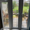 Photo 4: View over the patio towards the garden.