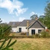 Photo 7: view of house from garden