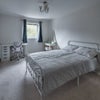 Photo 2: Double Room - work desk, dressing table, bed and storage