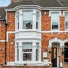 Photo 16: Front of House