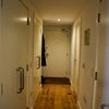 Photo 8: Hallway, view towards main entrance