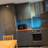 Photo 2: Kitchen area 