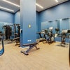 Photo 8: Fully equipped gym 