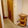 Photo 8: Hallway with storage cupboards