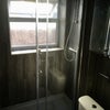 Photo 14: Communal Bathroom 1