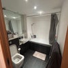 Photo 3: Private Bathroom with a Tub