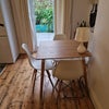 Photo 1: Dining area and sunny courtyard