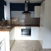 Photo 2: Kitchen (attached to living room)