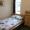 Photo 1: Double bedroom with large built in wardrobe
