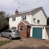 Photo 3: Front of house and parking