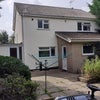 Photo 9: Back of house and patio