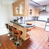 Photo 7: Large Kitchen with breakfast bar - fully equipped