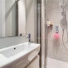 Photo 5: Shared bathroom with rainfall shower (with separate attachment head) and under-floor heating
