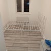 Photo 1: Small  bed freshly decorated with double bed and  laminate flooring. Use of own toilet, however, sha