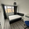 Photo 2: Bedroom with double  ottoman 