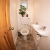 Photo 7: Toilet (1 of 2 in the house)