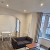Photo 2: Living Area & Dining