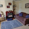 Photo 3: The living room will look slightly different to this