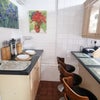 Photo 10: Large Kitchen with breakfast bar - fully equipped