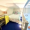 Photo 4: Mezzanine bedroom area 