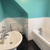 Photo 4: The bathroom shared with only one more room 