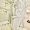 Photo 3: Private bathroom