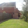 Photo 2: Pleasant back garden with shed and patio