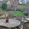 Photo 3: lovey garden area and table and chairs