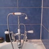 Photo 6: taps & shower head which can be attached to the wall.