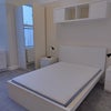 Photo 5: Double bed, full height wardrobe & storage