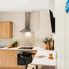 Photo 8: COMMUNAL KITCHEN