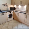 Photo 5: Kitchen - with washing machine and dishwasher